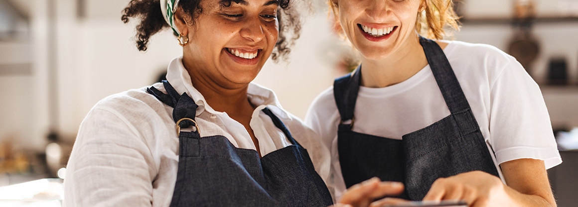 Two people taking orders