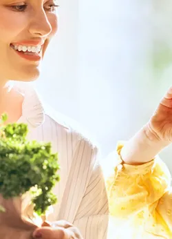 Kid and parent with vegetables 